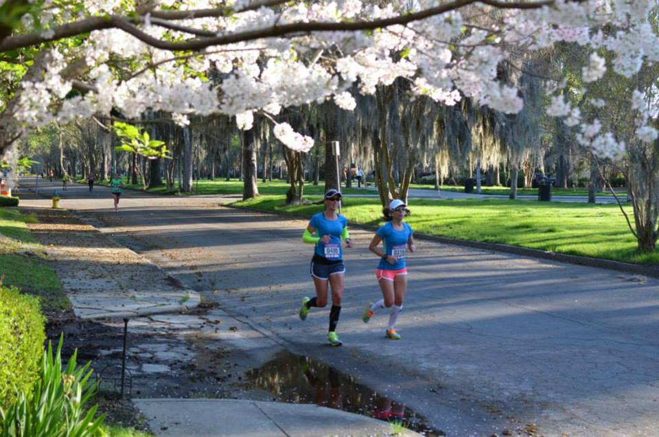 runners enjoy running through Forsyth Park in Savannah, GA